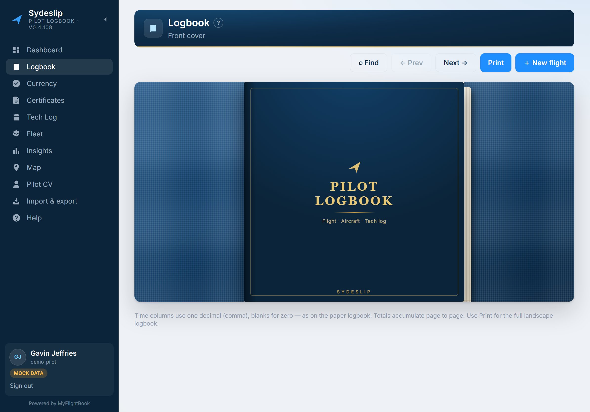 The logbook's closed navy cover, gold-lettered PILOT LOGBOOK, before it opens onto the spread.